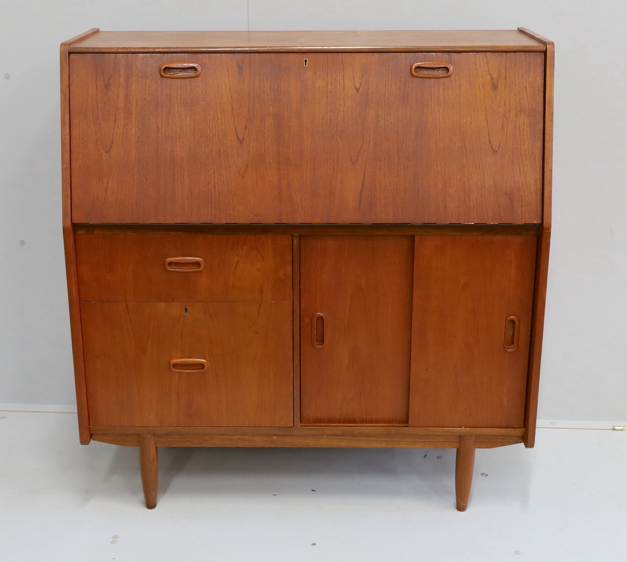 A mid century teak bureau, width 99cm, depth 41cm, height 104cm